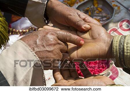 "Palmist reading the hand of a customer, Kathmandu, Kathmandu District, Bagmati Zone, Nepal, Asia" View Large Photo Image Stock Image - "Palmist reading the hand of a customer, Kathmandu, Kathmandu District, Bagmati Zone, Nepal, Asia". Fotosearch