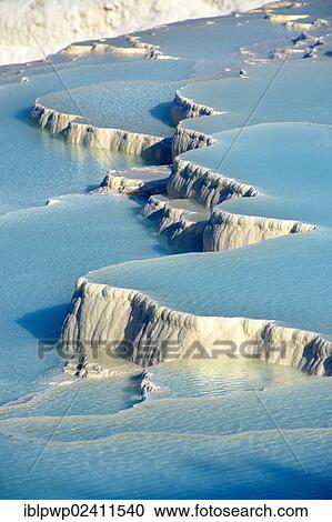 Stock Image - "Pamukkale travetine terrace, white calcium carbonate rock formations, Turkey, Asia". Fotosearch