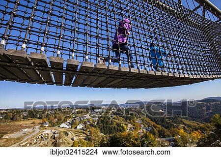 Panorama-Erlebnis-Bruecke adventure bridge, a 20 meters high and 435 meters long metal bridge on Winterberger Kappe mountain, Winterberg, Sauerland, North Rhine-Westphalia, Germany, Europe View Large Photo Image Picture - Panorama-Erlebnis-Bruecke adventure bridge, a 20 meters high and 435 meters long metal bridge on Winterberger Kappe mountain, Winterberg, Sauerland, North Rhine-Westphalia, Germany, Europe. Fotosearch