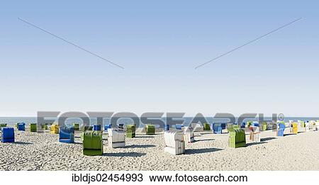 "Panoramic image, colourful roofed wicker beach chairs on the beach near Wyk, Foehr Island, North Frisian Islands, Schleswig-Holstein, Germany, Europe" View Large Photo Image Stock Image - "Panoramic image, colourful roofed wicker beach chairs on the beach near Wyk, Foehr Island, North Frisian Islands, Schleswig-Holstein, Germany, Europe". Fotosearch