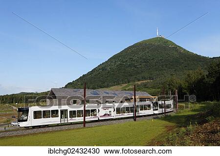 "Panoramic train with station and Domes mountain, Parc Naturel Regional des Volcans d'Auvergne, Natural Regional Park of Auvergne Volcanoes, Auvergne, France, Europe" View Large Photo Image Stock Image - "Panoramic train with station and Domes mountain, Parc Naturel Regional des Volcans d'Auvergne, Natural Regional Park of Auvergne Volcanoes, Auvergne, France, Europe". Fotosearch
