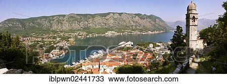"Panoramic view from the medieval hill fortifications above Kotor across roof tops and Kotor Bay, Monte, Europe" View Large Photo Image Stock Image - "Panoramic view from the medieval hill fortifications above Kotor across roof tops and Kotor Bay, Monte, Europe". Fotosearch