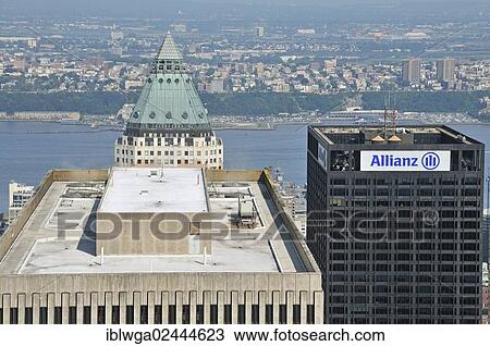 Stock Image - "Panoramic view from the Top of the Rock observation deck at the Rockefeller Center of the Exxon Building, One Worldwide Plaza and the Hudson River at back, Manhattan, New York City, USA, North America". Fotosearch
