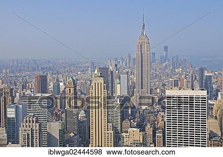 "Panoramic view from the Top of the Rock observation deck at the Rockefeller Center of the Empire State Building and downtown Manhattan, Manhattan, New York City, USA, North America" View Large Photo Image Stock Photo - "Panoramic view from the Top of the Rock observation deck at the Rockefeller Center of the Empire State Building and downtown Manhattan, Manhattan, New York City, USA, North America". Fotosearch