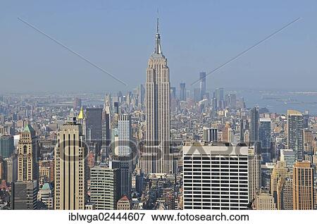 "Panoramic view from the Top of the Rock observation deck at the Rockefeller Center of the Empire State Building to downtown Manhattan, Manhattan, New York City, USA, North America" View Large Photo Image Stock Photo - "Panoramic view from the Top of the Rock observation deck at the Rockefeller Center of the Empire State Building to downtown Manhattan, Manhattan, New York City, USA, North America". Fotosearch
