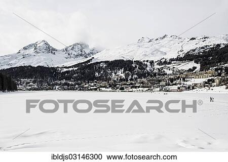 "Panoramic view, frozen Lake St. Moritz with the city and mountains, St. Moritz, Engadin, Graubunden, Switzerland, Europe" View Large Photo Image Stock Image - "Panoramic view, frozen Lake St. Moritz with the city and mountains, St. Moritz, Engadin, Graubunden, Switzerland, Europe". Fotosearch