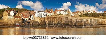Stock Image - "Panoramic view of the harbour of Robin Hood's Bay, North Yorkshire, England, United Kingdom, Europe". Fotosearch