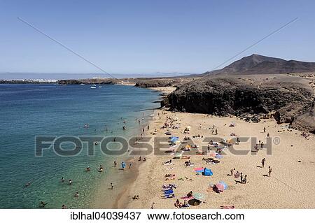 "Papagayo beaches or Playas de Papagayo, Playa Blanca rear left, rear right Hacha Grande, Lanzarote, Canary Islands, Spain, Europe" View Large Photo Image Stock Photo - "Papagayo beaches or Playas de Papagayo, Playa Blanca rear left, rear right Hacha Grande, Lanzarote, Canary Islands, Spain, Europe". Fotosearch