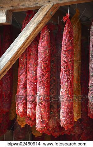 Picture - "Paprika chilis drying in a shed, Kalocsa, Hungary, Europe". Fotosearch