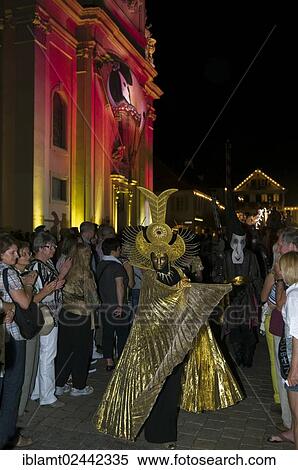 "Parade of mask wearers in front of the historic municipal church, Venetian Fair, on the historic Marktplatz market square, Ludwigsburg, Baden-Wuerttemberg, Germany, Europe" View Large Photo Image Stock Photography - "Parade of mask wearers in front of the historic municipal church, Venetian Fair, on the historic Marktplatz market square, Ludwigsburg, Baden-Wuerttemberg, Germany, Europe". Fotosearch