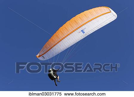 "Paraglider paragliding, Zwoelferhorn, Sankt Gilgen, Salzkammergut, Salzburg State, Austria, Europe" View Large Photo Image Stock Photography - "Paraglider paragliding, Zwoelferhorn, Sankt Gilgen, Salzkammergut, Salzburg State, Austria, Europe". Fotosearch