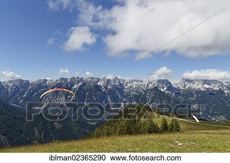 "Paraglider taking off from Hutterer Hoess, Hinterstoder, Totes Gebirge mountains, Pyhrn-Priel, Traunviertel region, Upper Austria, Austria, Europe" View Large Photo Image Stock Image - "Paraglider taking off from Hutterer Hoess, Hinterstoder, Totes Gebirge mountains, Pyhrn-Priel, Traunviertel region, Upper Austria, Austria, Europe". Fotosearch