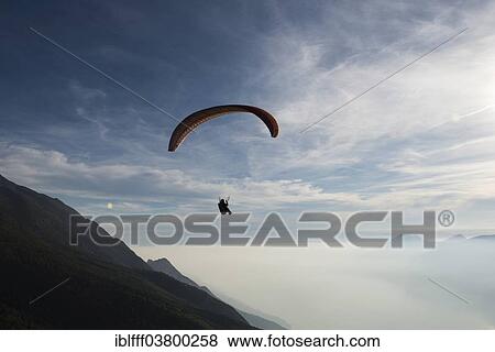 "Paragliding, paraglider, clouds, inversion, Lake Garda, Veneto, Italy, Europe" View Large Photo Image Stock Photo - "Paragliding, paraglider, clouds, inversion, Lake Garda, Veneto, Italy, Europe". Fotosearch