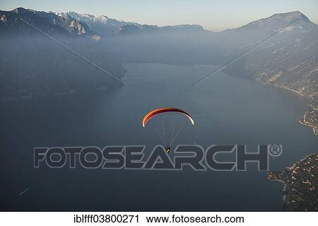 "Paragliding, paraglider, inversion, Lake Garda, Veneto, Italy, Europe" View Large Photo Image Stock Image - "Paragliding, paraglider, inversion, Lake Garda, Veneto, Italy, Europe". Fotosearch