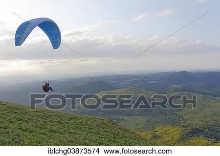 "Paragliding, Puy de Dome, Parc Naturel Regional des Volcans d'Auvergne, Auvergne, France, Europe" View Large Photo Image Picture - "Paragliding, Puy de Dome, Parc Naturel Regional des Volcans d'Auvergne, Auvergne, France, Europe". Fotosearch