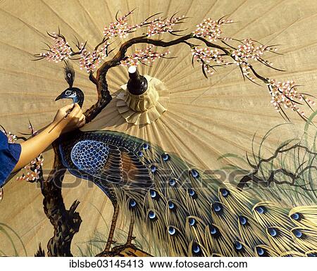 "Parasol painting, young woman painting a paper parasol, Bo Sang, Chiang Mai, Northern Thailand, Thailand, Asia" View Large Photo Image Stock Image - "Parasol painting, young woman painting a paper parasol, Bo Sang, Chiang Mai, Northern Thailand, Thailand, Asia". Fotosearch