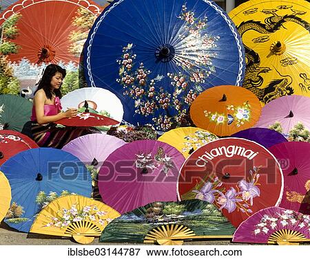 "Parasol painting, young woman painting silk parasols, Bo Sang, Chiang Mai, Northern Thailand, Thailand, Asia" View Large Photo Image Stock Photo - "Parasol painting, young woman painting silk parasols, Bo Sang, Chiang Mai, Northern Thailand, Thailand, Asia". Fotosearch