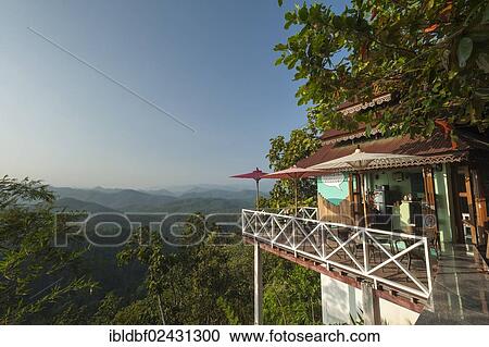 "Parasols on a cafe terrace with a view, Temple complex of Wat Phra That Doi Kong Mu, Mae Hong Son, Northern Thailand, Thailand, Asia" View Large Photo Image Stock Image - "Parasols on a cafe terrace with a view, Temple complex of Wat Phra That Doi Kong Mu, Mae Hong Son, Northern Thailand, Thailand, Asia". Fotosearch
