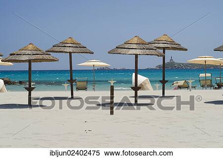 Stock Photography - "Parasols on the beach, Porto Giunco, Sardinia, Italy, Europe". Fotosearch