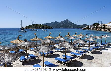 "Parasols, Sant Elm, municipality of Andratx, Sant Elm, Mallorca, Balearic Islands, Mediterranean Sea, Spain, Europe" View Large Photo Image Stock Image - "Parasols, Sant Elm, municipality of Andratx, Sant Elm, Mallorca, Balearic Islands, Mediterranean Sea, Spain, Europe". Fotosearch