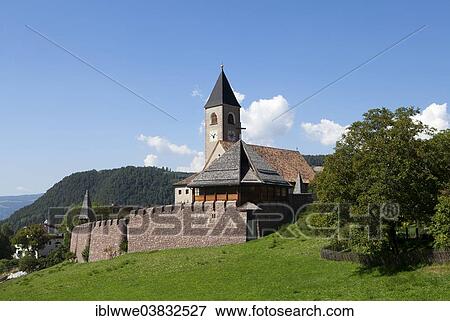 Stock Photo - "Parish Church of the Holy Cross, Seis am Schlern or Siusi allo Sciliar, South Tyrol, Italy, Europe". Fotosearch