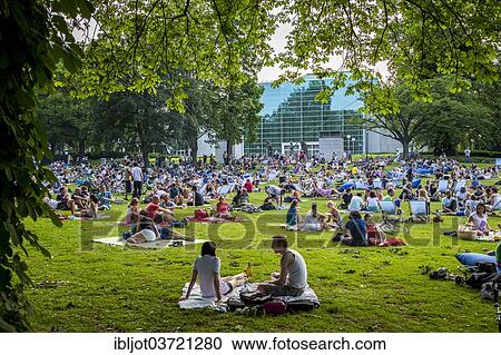 "Park Sounds"""", an event with electronic music and picnicking in the Stadtgarten Essen park, Essen, North Rhine-Westphalia, Germany, Europe" View Large Photo Image Stock Image - "Park Sounds"""", an event with electronic music and picnicking in the Stadtgarten Essen park, Essen, North Rhine-Westphalia, Germany, Europe". Fotosearch