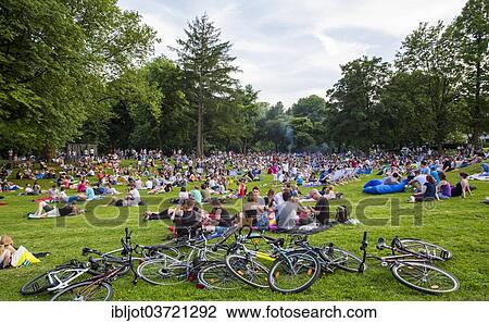 Stock Image - "Park Sounds"""", an event with electronic music and picnicking in the Stadtgarten Essen park, Essen, North Rhine-Westphalia, Germany, Europe". Fotosearch