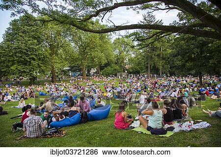"Park Sounds"""", an event with electronic music and picnicking in the Stadtgarten Essen park, Essen, North Rhine-Westphalia, Germany, Europe" View Large Photo Image Stock Photograph - "Park Sounds"""", an event with electronic music and picnicking in the Stadtgarten Essen park, Essen, North Rhine-Westphalia, Germany, Europe". Fotosearch