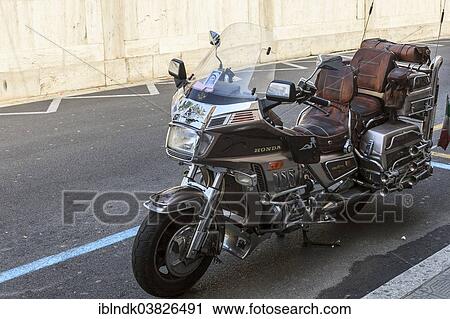 Stock Image - "Parked Honda Goldwing motorcycle, Liguria, Sanremo, Italy, Europe". Fotosearch