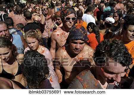 "Participants throwing tomatoes at each other during the annual Tomatina festival, Bunol, Province of Valencia, Spain, Europe" View Large Photo Image Stock Image - "Participants throwing tomatoes at each other during the annual Tomatina festival, Bunol, Province of Valencia, Spain, Europe". Fotosearch