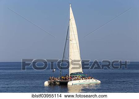 "Party boat off Cala Ratjada, Majorca, Balearic Islands, Spain, Europe" View Large Photo Image Picture - "Party boat off Cala Ratjada, Majorca, Balearic Islands, Spain, Europe". Fotosearch