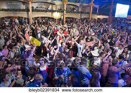 "Party in a beer tent, Cannstatter Wasen fairground, funfair, Bad Cannstatt, Stuttgart, Baden-Wuerttemberg, Germany, Europe" View Large Photo Image Picture - "Party in a beer tent, Cannstatter Wasen fairground, funfair, Bad Cannstatt, Stuttgart, Baden-Wuerttemberg, Germany, Europe". Fotosearch