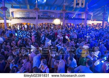 "Party in a beer tent, Cannstatter Wasen fairground, funfair, Bad Cannstatt, Stuttgart, Baden-Wuerttemberg, Germany, Europe" View Large Photo Image Stock Image - "Party in a beer tent, Cannstatter Wasen fairground, funfair, Bad Cannstatt, Stuttgart, Baden-Wuerttemberg, Germany, Europe". Fotosearch