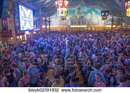 "Party in a beer tent, Cannstatter Wasen fairground, funfair, Bad Cannstatt, Stuttgart, Baden-Wuerttemberg, Germany, Europe" View Large Photo Image Stock Image - "Party in a beer tent, Cannstatter Wasen fairground, funfair, Bad Cannstatt, Stuttgart, Baden-Wuerttemberg, Germany, Europe". Fotosearch