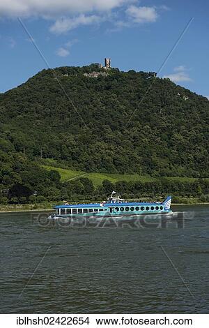 Passenger ship Moby Dick travelling on the Rhine, Drachenfels, Dragon's Rock, at back, Koenigswinter, North Rhine-Westphalia, Germany, Europe View Large Photo Image Picture - Passenger ship Moby Dick travelling on the Rhine, Drachenfels, Dragon's Rock, at back, Koenigswinter, North Rhine-Westphalia, Germany, Europe. Fotosearch