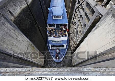 Stock Photo - "Passenger ship on the Saar river, Mettlach lock, Saarland, Germany, Europe". Fotosearch