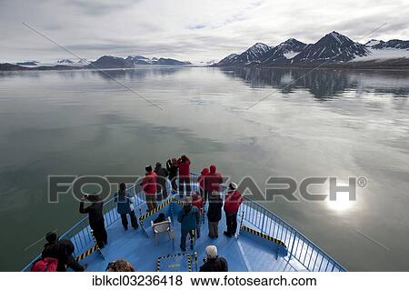 "Passengers of the expedition cruise ship, MS Quest, observing the scenery of Kongsfjorden, Spitsbergen Island, Svalbard Archipelago, Svalbard and Jan Mayen, Norway, Europe" View Large Photo Image Stock Photo - "Passengers of the expedition cruise ship, MS Quest, observing the scenery of Kongsfjorden, Spitsbergen Island, Svalbard Archipelago, Svalbard and Jan Mayen, Norway, Europe". Fotosearch