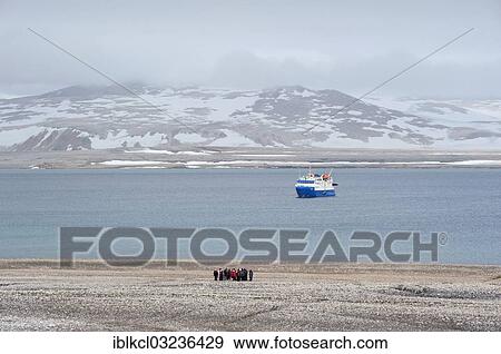 "Passengers of the expedition cruise ship, MS Quest, hiking across the Arctic ice desert, Zorgdragerfjorden, Prins Oscars Land, Nordaustlandet, Svalbard Archipelago, Svalbard and Jan Mayen, Norway, Europe" View Large Photo Image Stock Photo - "Passengers of the expedition cruise ship, MS Quest, hiking across the Arctic ice desert, Zorgdragerfjorden, Prins Oscars Land, Nordaustlandet, Svalbard Archipelago, Svalbard and Jan Mayen, Norway, Europe". Fotosearch