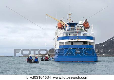 "Passengers returning after being ashore in Zodiac inflatable boats to the expedition cruise ship, MS Quest, Spitsbergen Island, Svalbard Archipelago, Svalbard and Jan Mayen, Norway, Europe" View Large Photo Image Picture - "Passengers returning after being ashore in Zodiac inflatable boats to the expedition cruise ship, MS Quest, Spitsbergen Island, Svalbard Archipelago, Svalbard and Jan Mayen, Norway, Europe". Fotosearch
