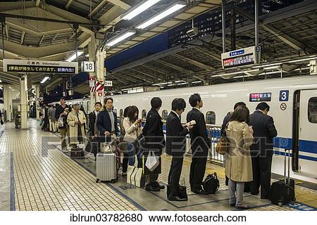 "Passengers waiting in line, Shinkansen train station, Tokyo, Japan, Asia" View Large Photo Image Stock Image - "Passengers waiting in line, Shinkansen train station, Tokyo, Japan, Asia". Fotosearch