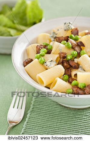 "Pasta served with peas, bacon and blue cheese" View Large Photo Image Stock Image - "Pasta served with peas, bacon and blue cheese". Fotosearch