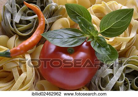 "Pasta, tomato, basil, chili" View Large Photo Image Stock Image - "Pasta, tomato, basil, chili". Fotosearch