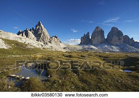 Stock Image - "Paternkofel Mountain and the north face of the Three Peaks, Sextner Dolomiten, South Tyrol province, Trentino-Alto Adige, Italy, Europe". Fotosearch