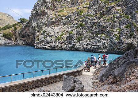 Picture - "Path through rocks to the hidden Bay of Sa Calobra, Tramuntana Mountains, Majorca, Balearic Islands, Mediterranean Sea, Spain, Europe". Fotosearch