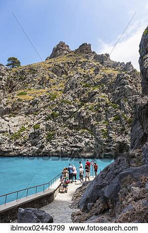 "Path through rocks to the hidden Bay of Sa Calobra, Tramuntana Mountains, Majorca, Balearic Islands, Mediterranean Sea, Spain, Europe" View Large Photo Image Stock Photo - "Path through rocks to the hidden Bay of Sa Calobra, Tramuntana Mountains, Majorca, Balearic Islands, Mediterranean Sea, Spain, Europe". Fotosearch