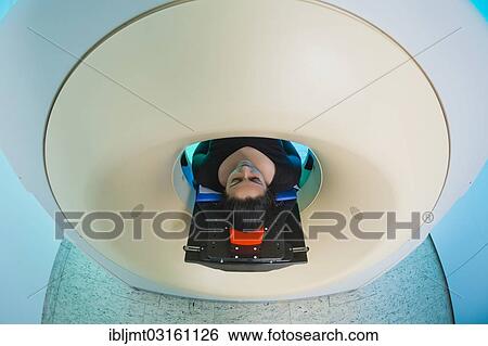"Patient lying in a computed tomography, CT scanner, Germany, Europe" View Large Photo Image Stock Photograph - "Patient lying in a computed tomography, CT scanner, Germany, Europe". Fotosearch