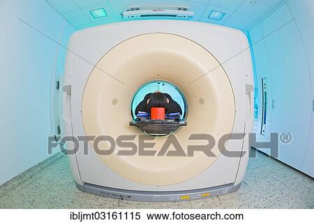 Stock Photography - "Patient lying in a computed tomography, CT scanner, Germany, Europe". Fotosearch