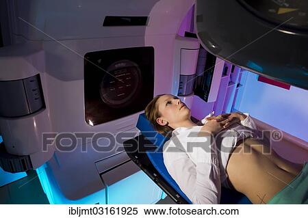 "Patient lying in a linear particle accelerator for radiation treatment, Germany, Europe" View Large Photo Image Stock Photography - "Patient lying in a linear particle accelerator for radiation treatment, Germany, Europe". Fotosearch