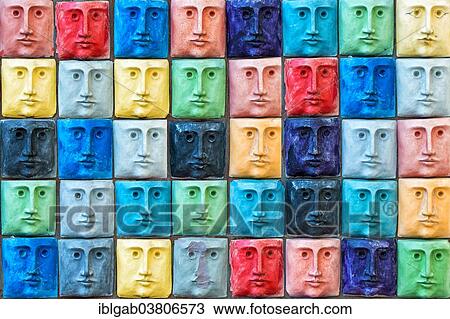Stock Image - "Pattern of tiles depicting faces, Aveiro, Centro region, Portugal, Europe". Fotosearch