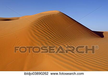 "Patterns of the sand dunes of the Wahiba Sands desert, also known as Ramlat al-Wahiba or Sharqiya Sands, in morning light, Hawiyah, Ash Sharqiyah, Oman, Asia" View Large Photo Image Stock Image - "Patterns of the sand dunes of the Wahiba Sands desert, also known as Ramlat al-Wahiba or Sharqiya Sands, in morning light, Hawiyah, Ash Sharqiyah, Oman, Asia". Fotosearch